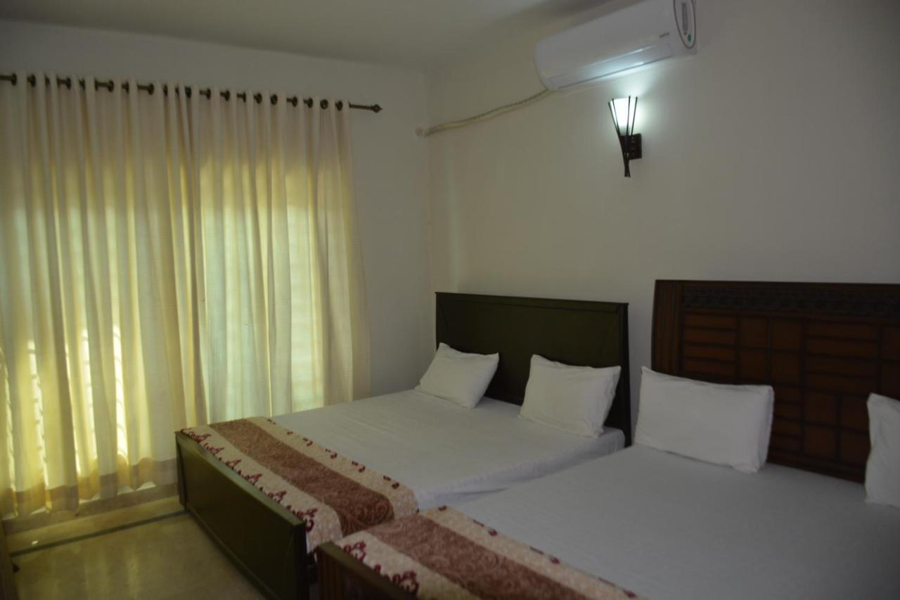 The Travelers Den Hotel Islamabad Buitenkant foto